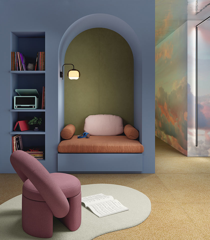 Modernes Interieur mit sanften Farben, strukturiertem Boden und einer gemütlichen Nische.