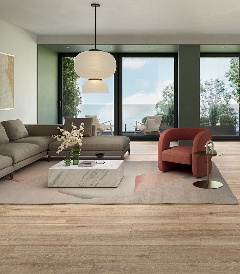 Moderner Wohnbereich mit Boden aus der Kollektion Bio Attitude in Holzoptik im Farbton Amber.