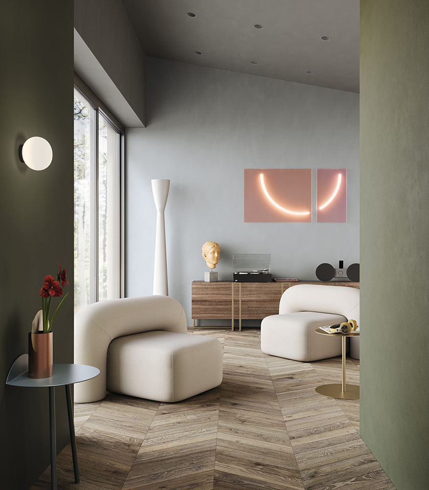 Entdecken Sie Ideen für ein modernes Wohnzimmer mit Holzoptik-Oberflächen von Lea Ceramiche, die natürliche Wärme, modernes Design und raffinierte Farbkontraste vereinen.